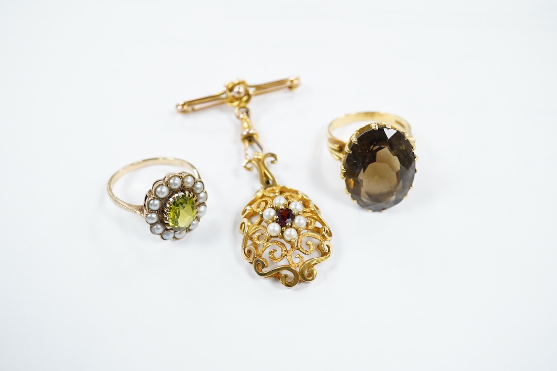A yellow metal stick pin, the terminal modelled as a Knight's arm holding a scroll(a.f.), 79mm, together with two pairs of yellow metal and gem set ear clips including 9ct and opal doublet.